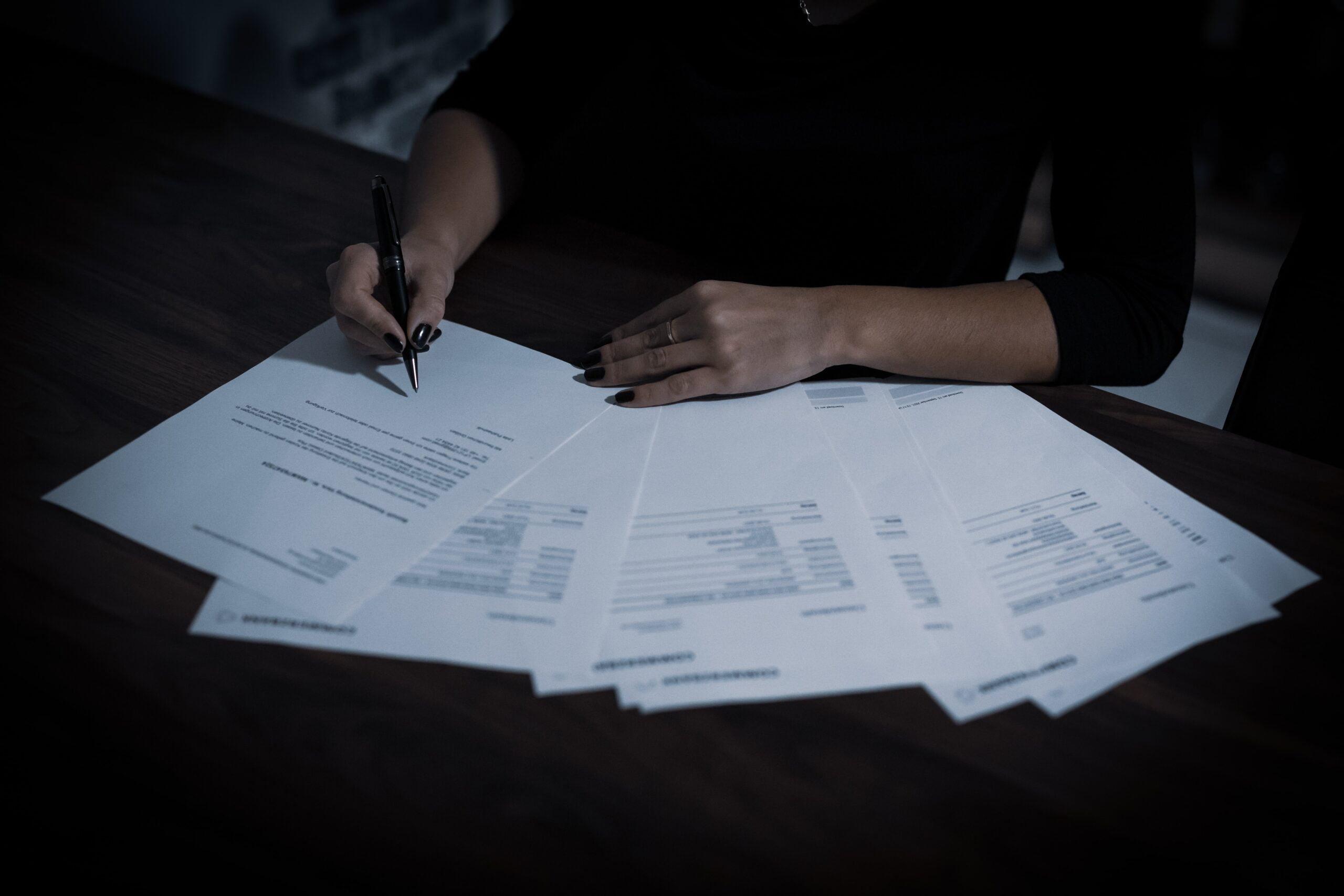 office worker filling out paperwork